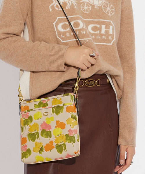 Coach Leather Messenger Crossbody With Floral Print